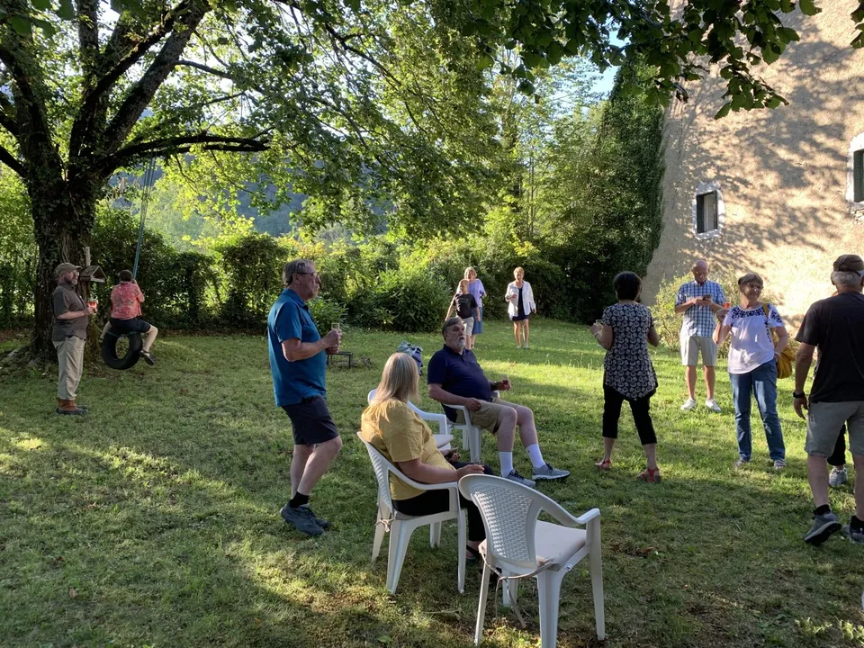 Pastors gathered on the lawn during a conference at the house